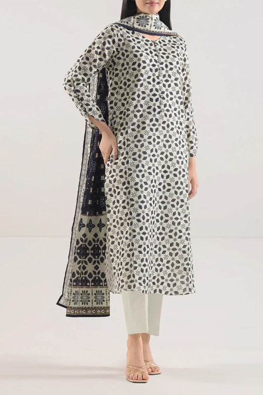 Woman wearing a patterned kurta with a matching dupatta on a white background
