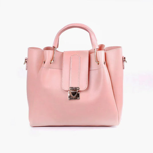 Pink handbag with a lock on a white background
