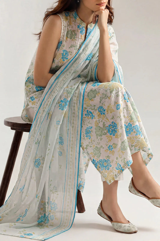 Woman wearing a floral saree with a white background
