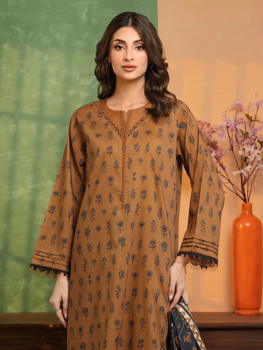 Woman wearing a brown floral dress with a vase and flowers in the background