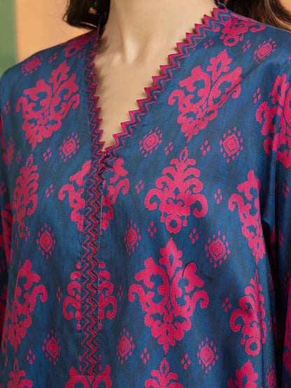 Blue garment with pink floral patterns on a mannequin