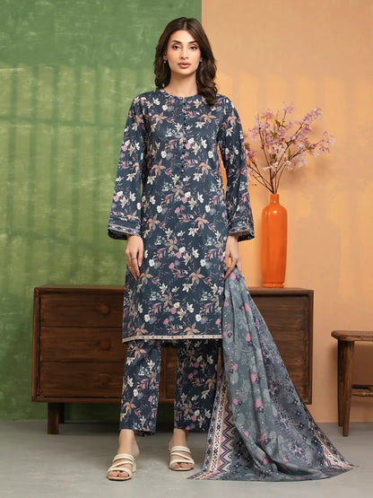 Woman wearing a floral dress with a matching dupatta against a green and orange background.