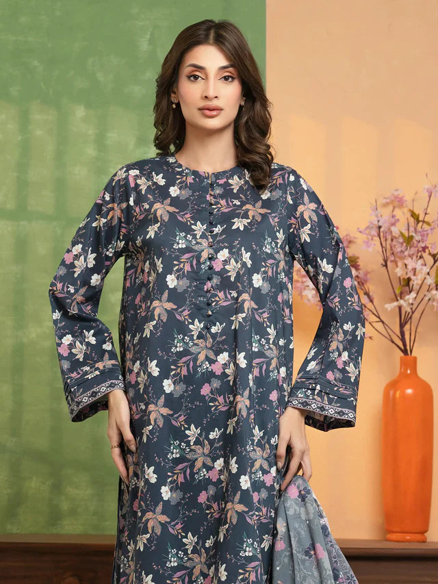 Woman wearing a floral dress with a green and orange background