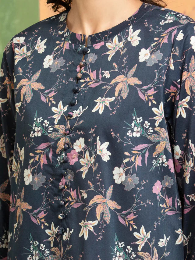 Floral patterned shirt with a focus on the collar and buttons.