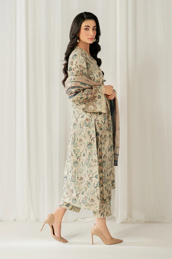Woman wearing a floral dress against a white curtain background
