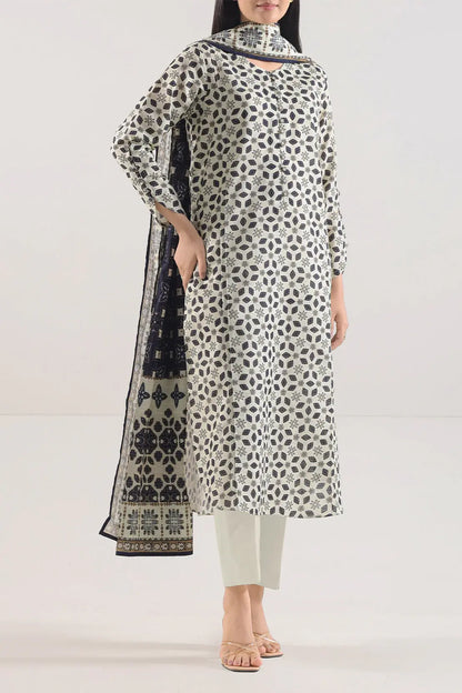 Woman wearing a patterned kurta with a matching dupatta on a white background