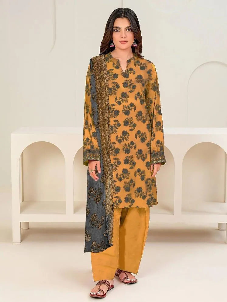 Woman wearing a mustard yellow kurta with black floral patterns and palazzo pants against a white background.