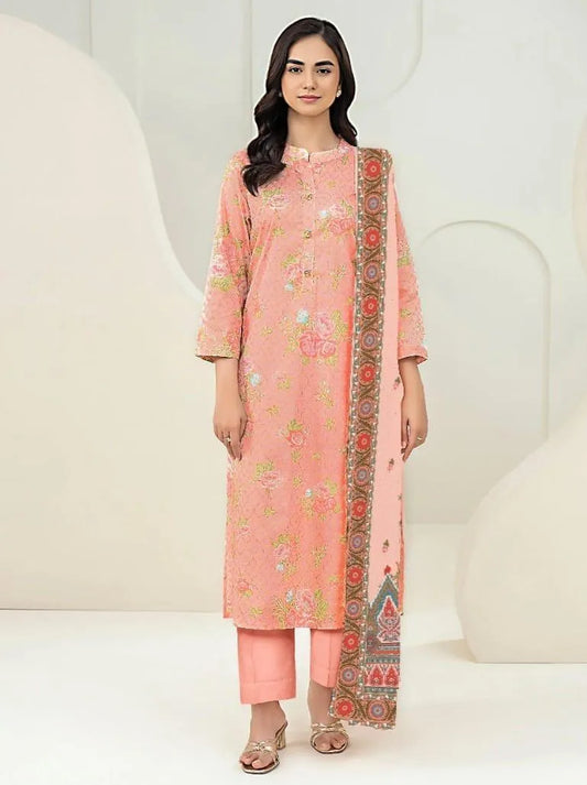 Woman wearing a peach-colored traditional outfit with floral patterns on a white background