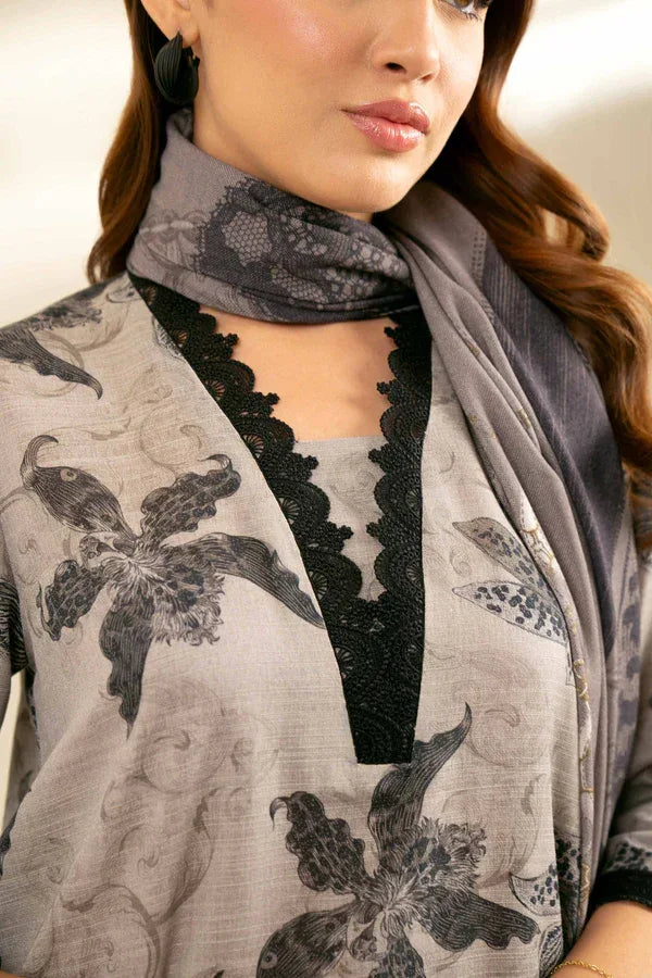 Woman wearing a floral-patterned scarf with a neutral background