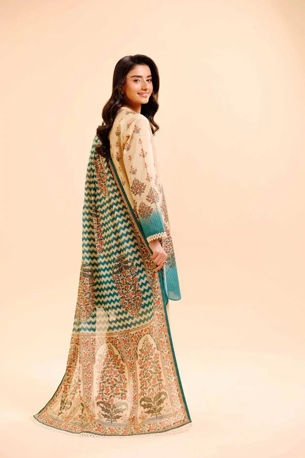 Woman wearing a traditional embroidered outfit with a matching shawl on a beige background