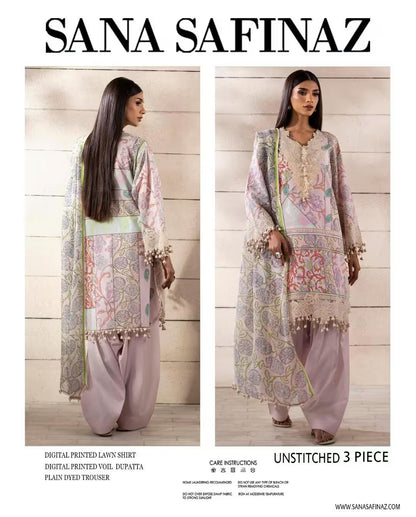Sana Safinaz un-stitched 3-piece outfit with digital printed shirt, voil dupatta, and plain ivy trousers on a wooden background.