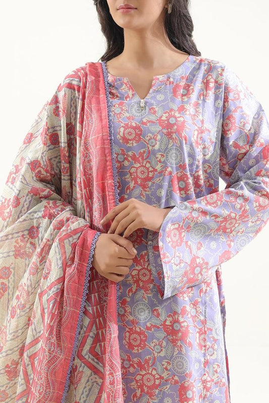 Woman wearing a floral kurta with a matching dupatta on a white background