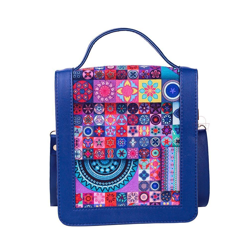 Colorful patterned bag with blue accents on a white background