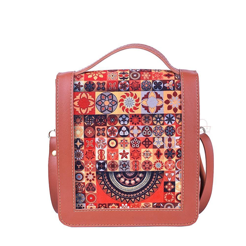 Handbag with a colorful geometric pattern on a white background