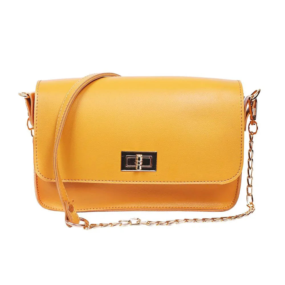 Yellow handbag with a chain strap on a white background