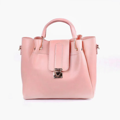 Pink handbag with a lock on a white background