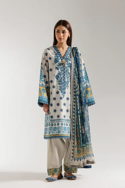 Woman wearing a blue and white embroidered outfit with a matching dupatta on a white background