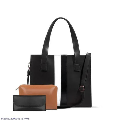 Black handbag with a white stripe and a matching brown pouch on a white background