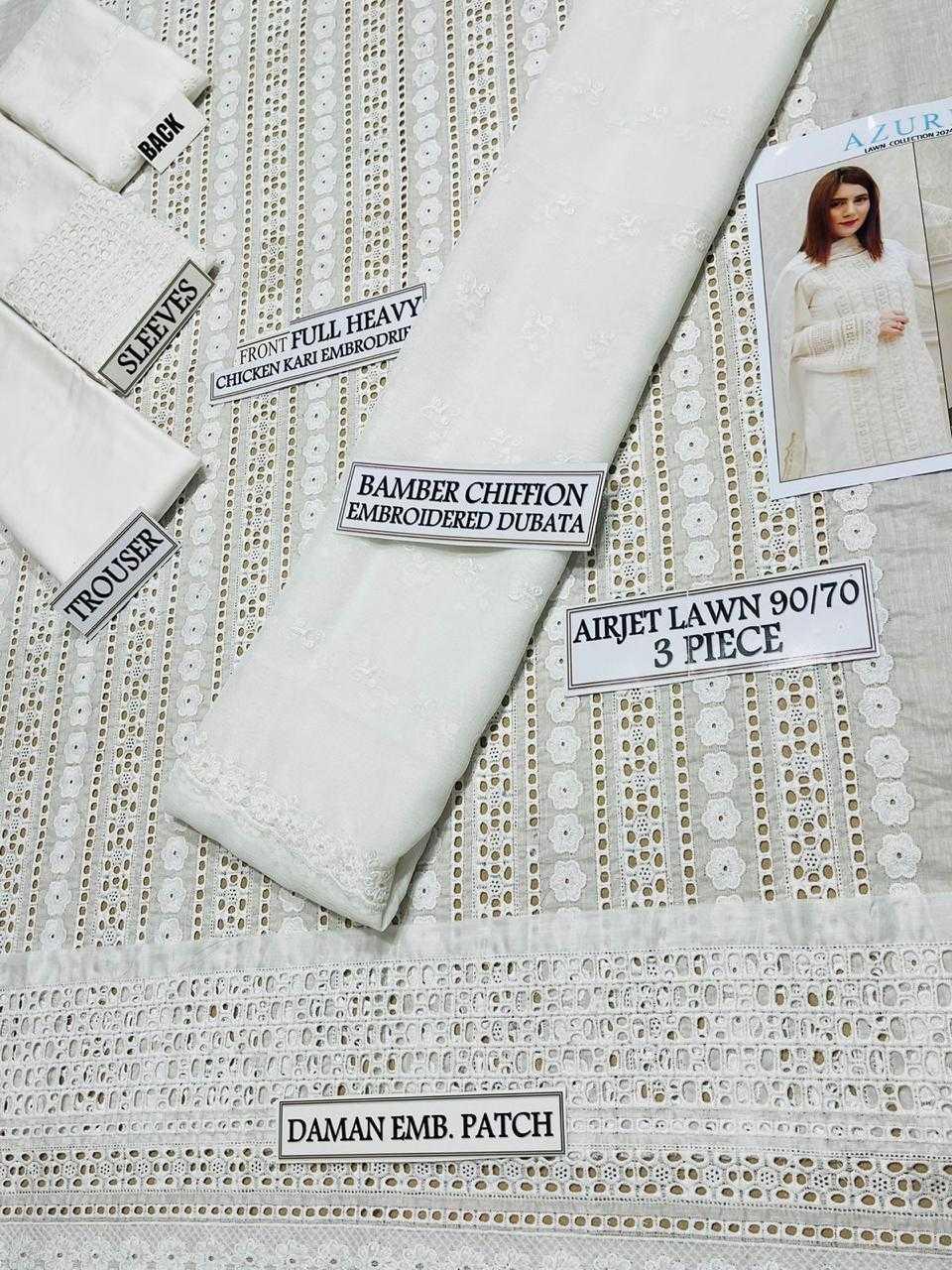 Textiles with labels indicating fabric types and patterns on a textured surface.