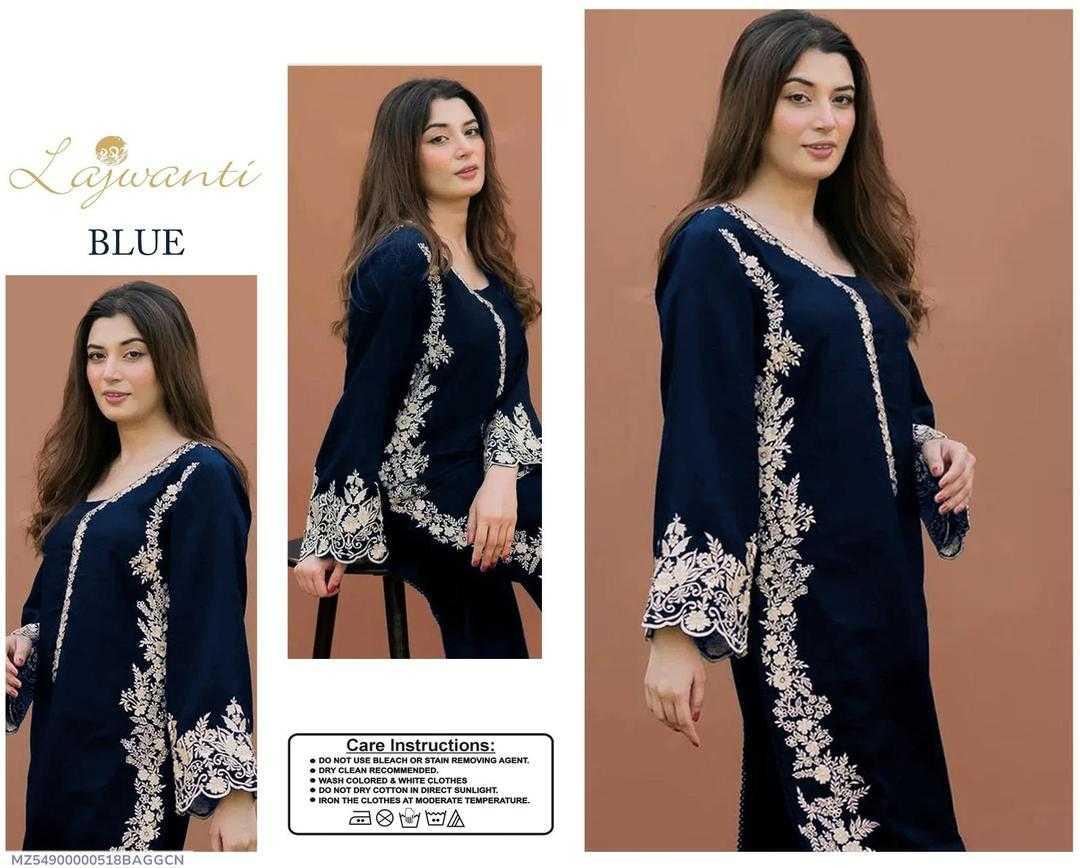 Navy blue outfit with white embroidery on a brown background, featuring the brand 'Lajwanti'.