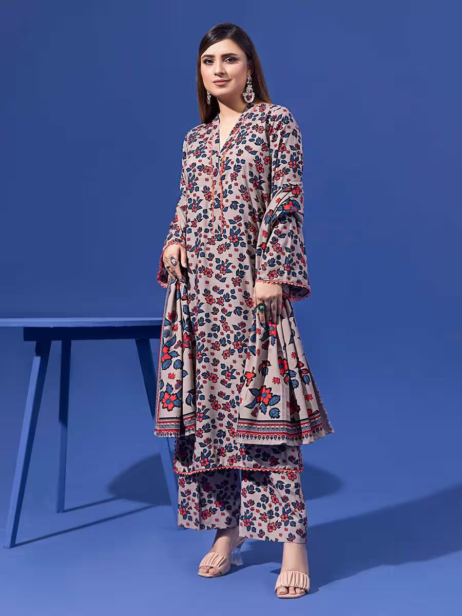 Woman wearing a floral outfit on a blue background