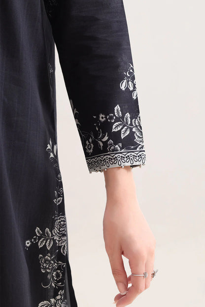 Navy blue fabric with white floral embroidery on a plain background