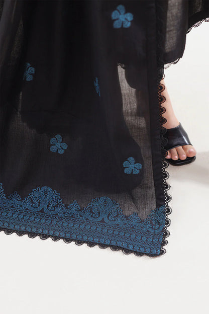 Black garment with blue floral embroidery on a white background