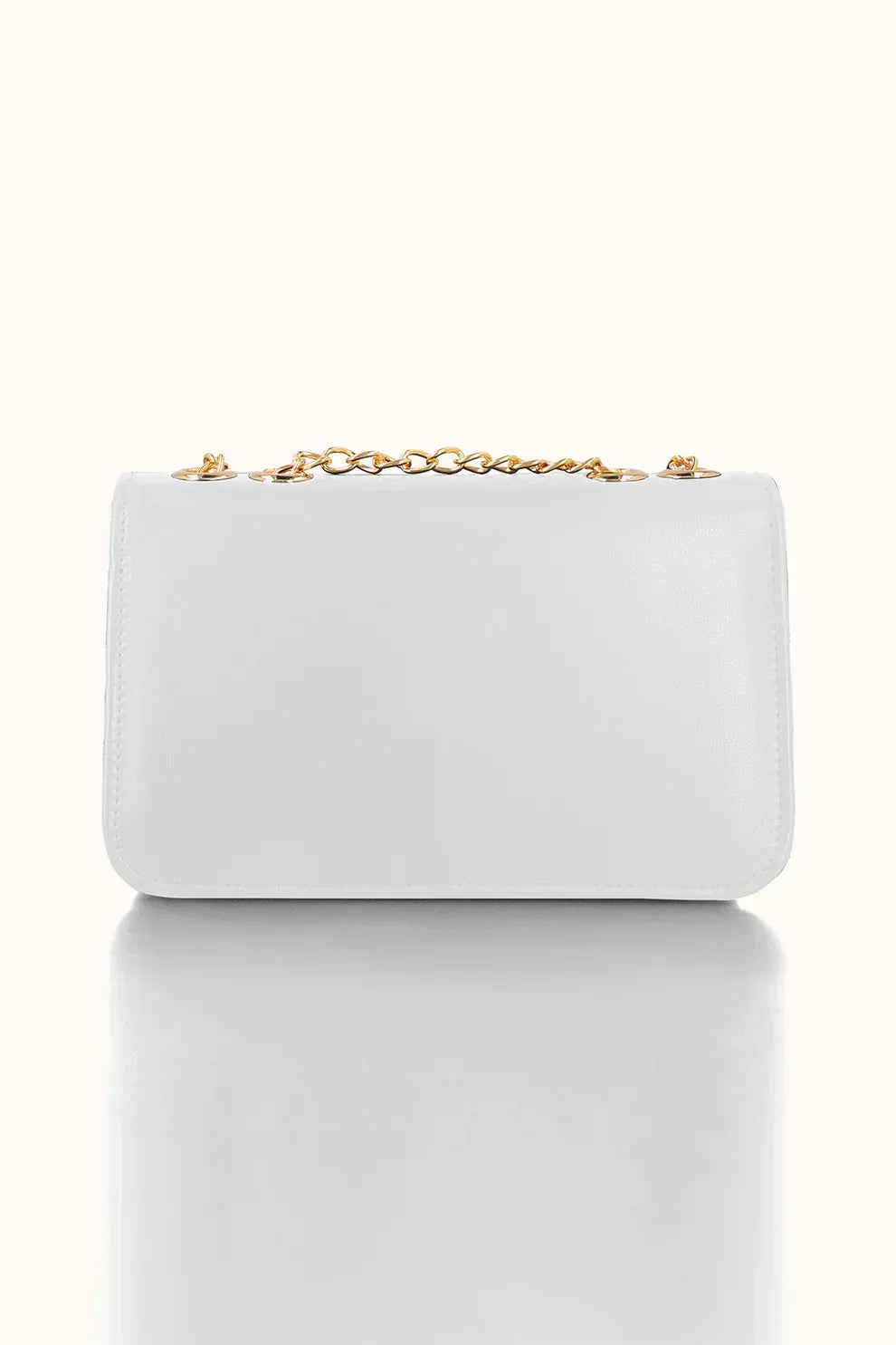 Light blue handbag with a gold chain on a white background