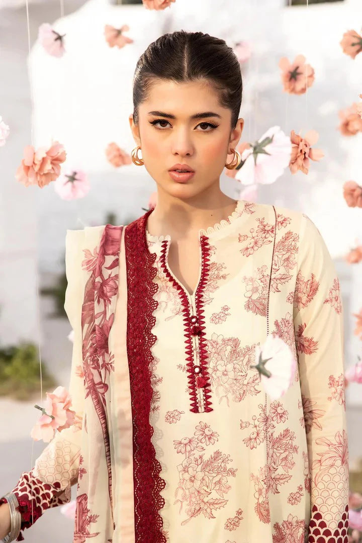 Woman wearing a floral and lace-patterned outfit with a soft focus floral background