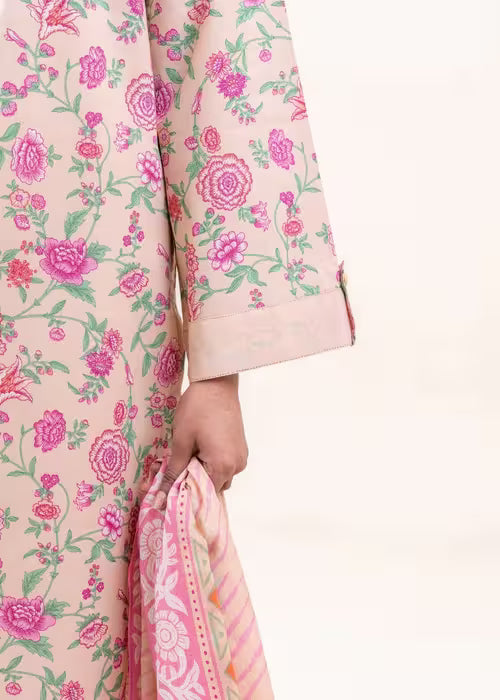 Floral-patterned garment with pink and green flowers on a light background