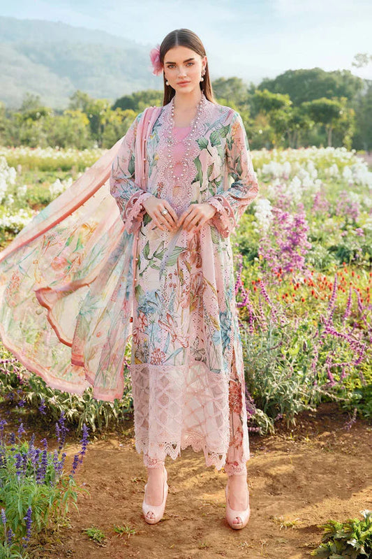 Woman in a floral dress standing in a field of flowers